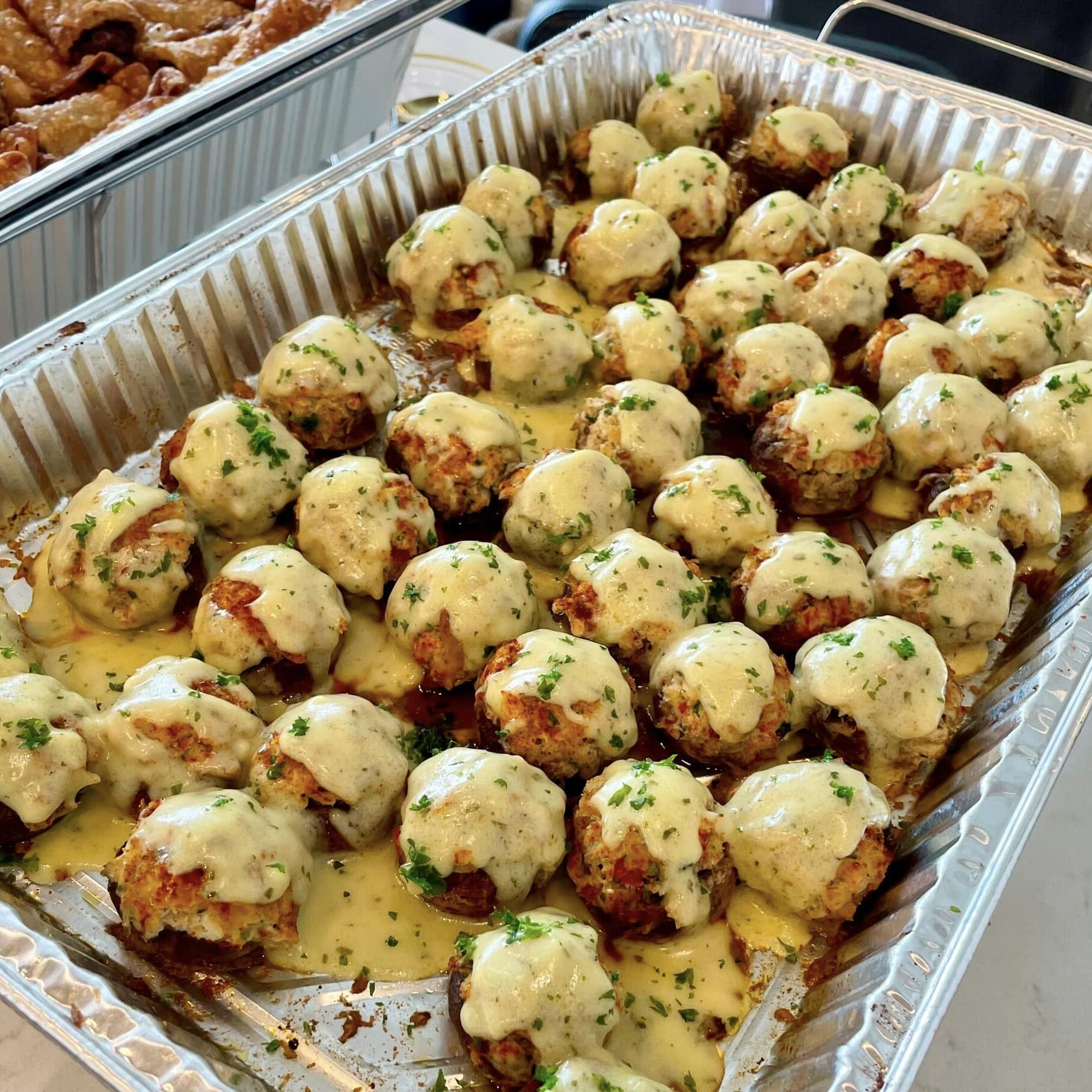 Crab-Stuffed Mushrooms drizzled with Bernaise